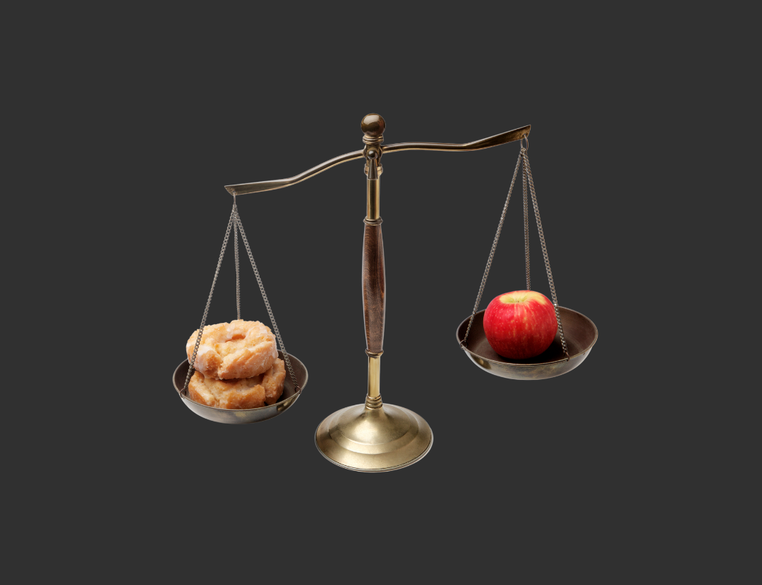 scales with donut and apple