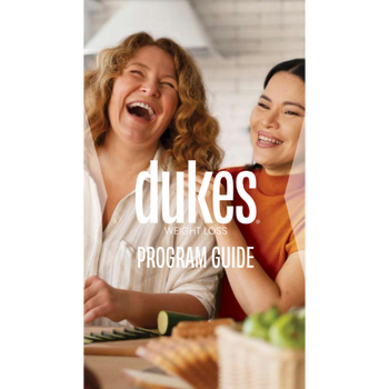 Cover of Dukes Weight Loss Program Guide with two woman laughing while cutting vegetables. 