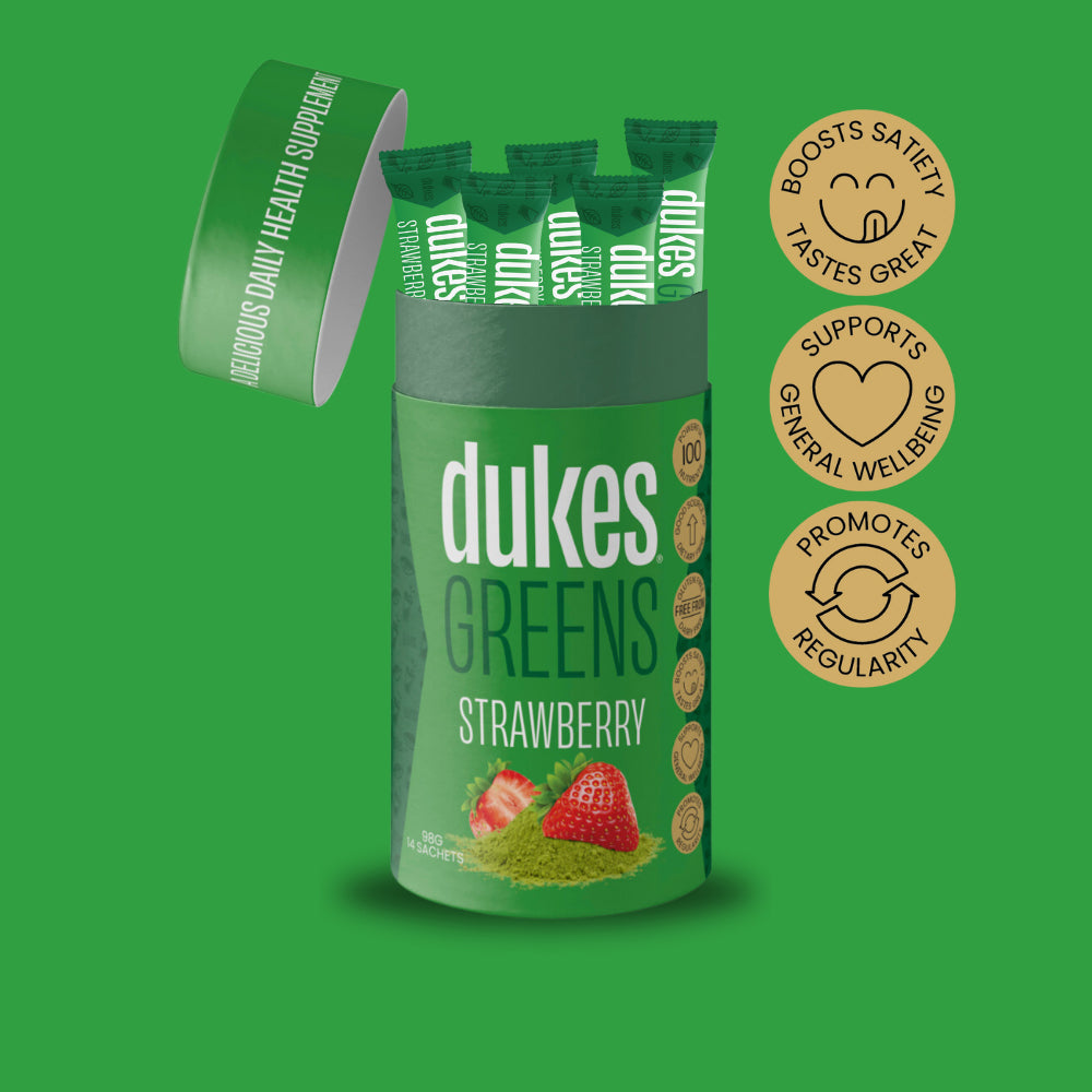 Tube of Dukes Greens Strawberry Flavour showing sachets. Badges on the side reading: Boosts Satiety, Supports General Wellbeing, Promotes Regularity. 