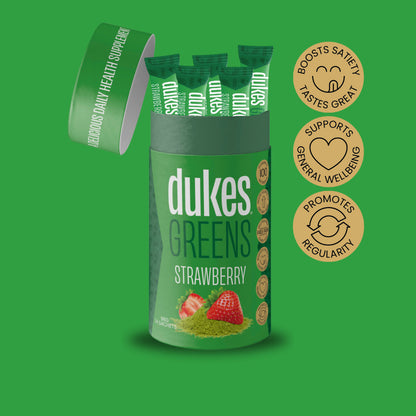 Tube of Dukes Greens Strawberry Flavour showing sachets. Badges on the side reading: Boosts Satiety, Supports General Wellbeing, Promotes Regularity. 