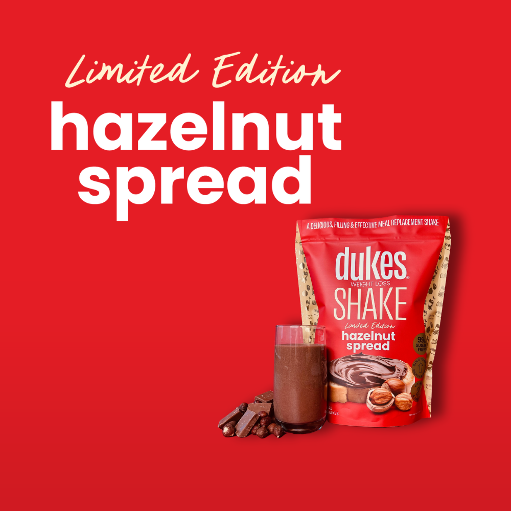 A bag of Dukes Hazelnut spread meal replacement on a red background