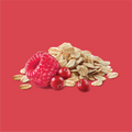 A raspberry, a few cranberries a pile of oats on a red background