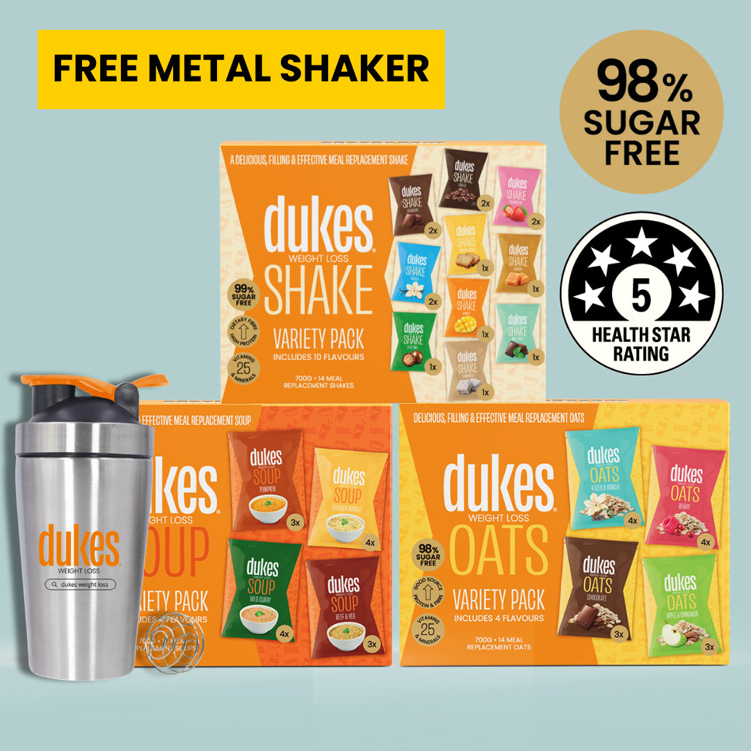 Three Dukes Shake, Soup and Oats Variety Packs next to a Dukes Protein Shaker. Text above reads: "Free shaker, 99% sugar free, 5 health star rating"