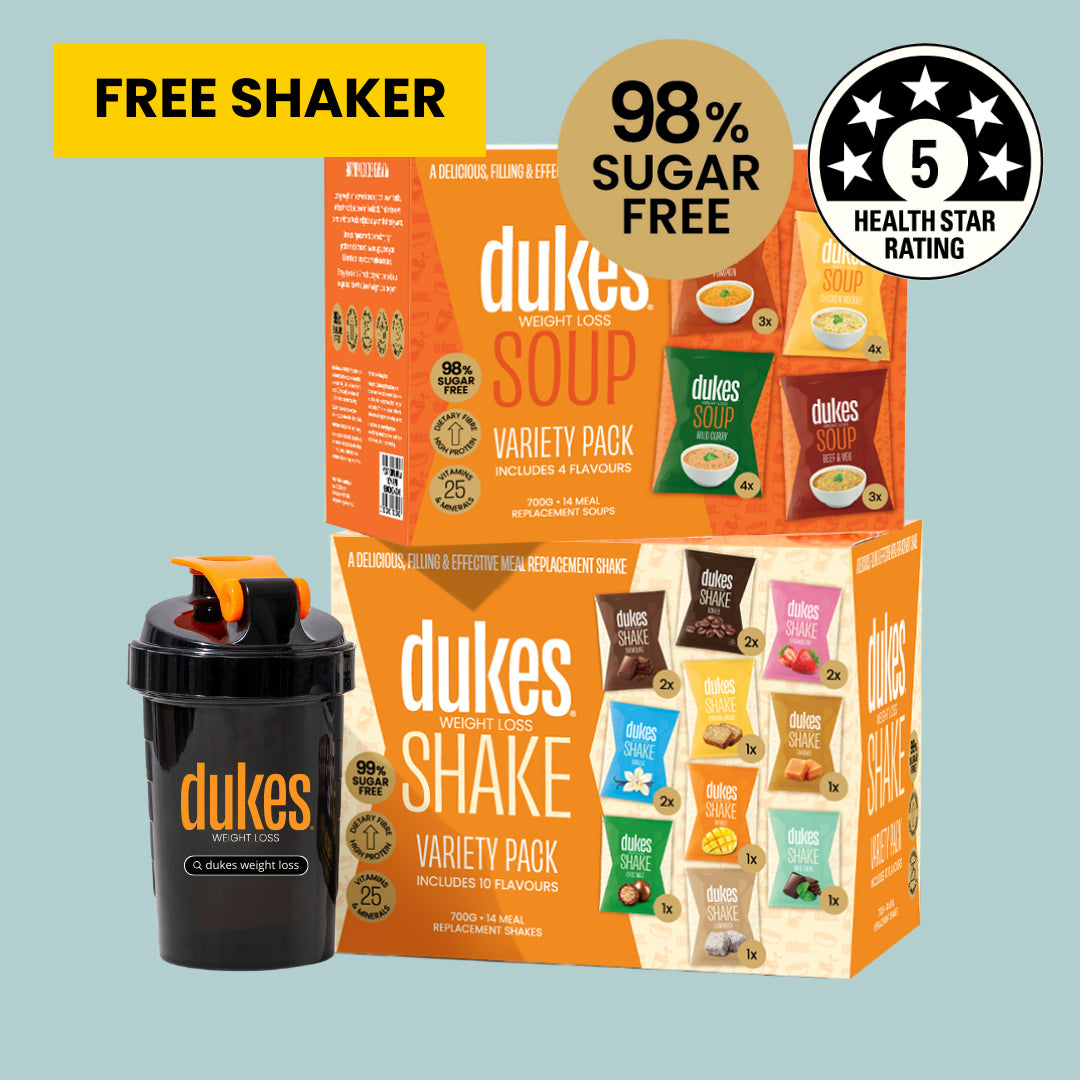 Two Dukes Shake and Soup Variety Packs next to a Dukes Protein Shaker. Text above reads: "Free shaker, 99% sugar free, 5 health star rating"